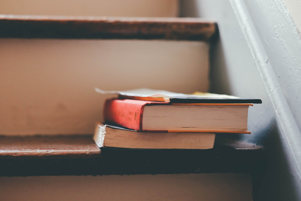 Stack of Books on the Stairs
