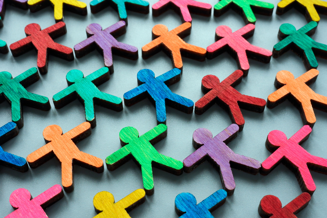 Small colorful figurines as symbol of diversity and inclusion.